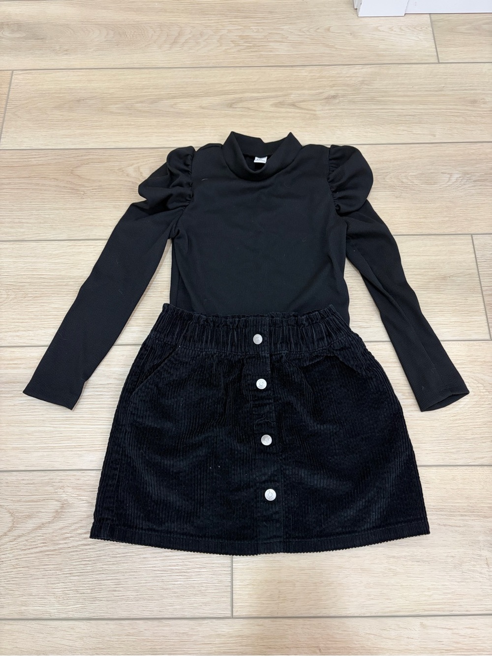 Girls Black Long-Sleeve Puff Shoulder Top & Corduroy Button Skirt Set. Size 6/7